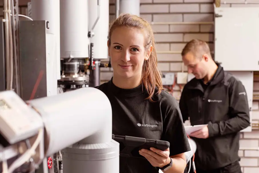 Två servicetekniker från Kraftringen.